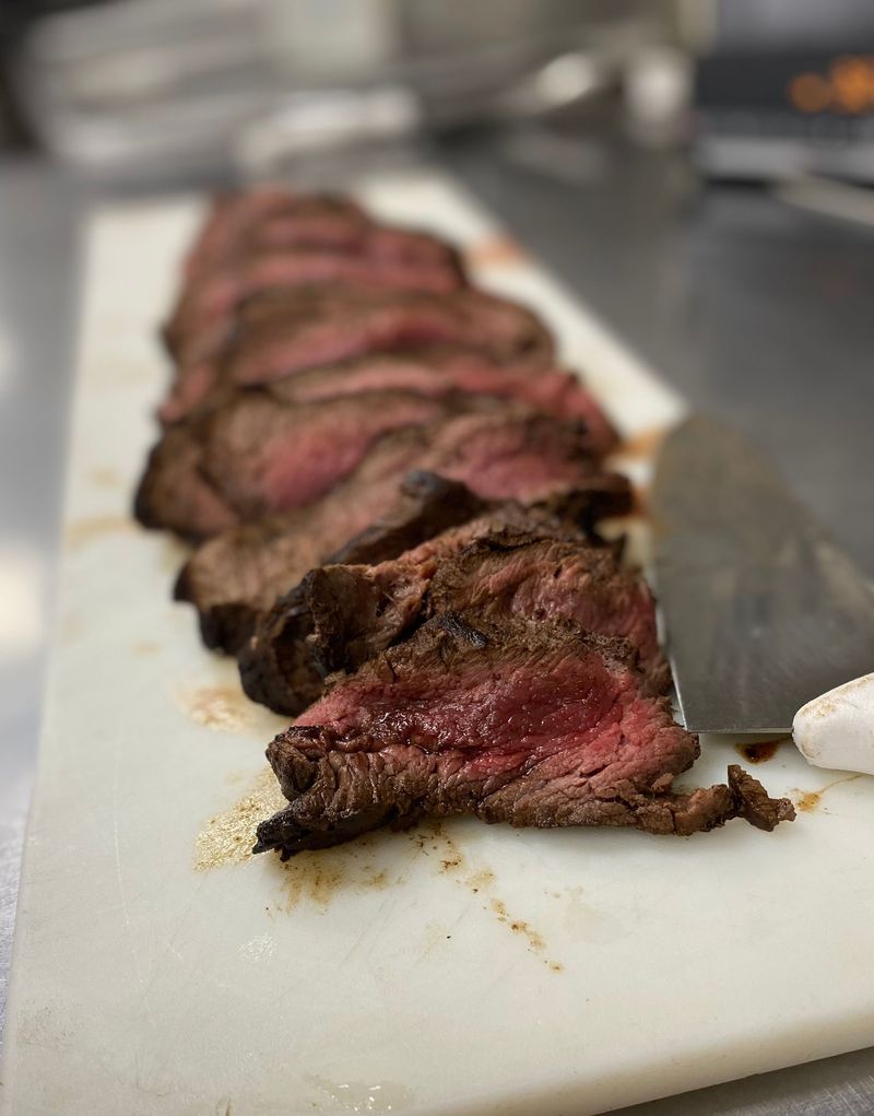 Sliced brisket on a cutting board