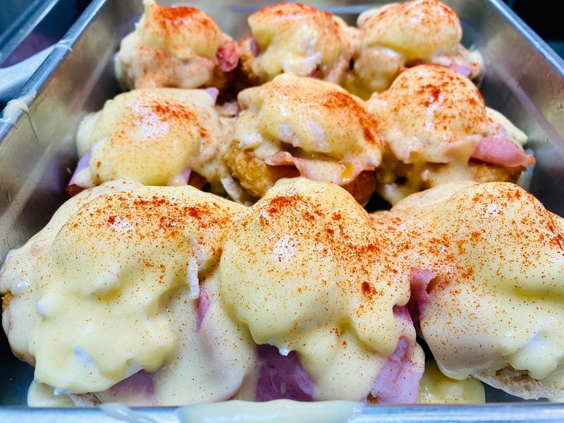 Ravioli topped with cream sauce and paprika