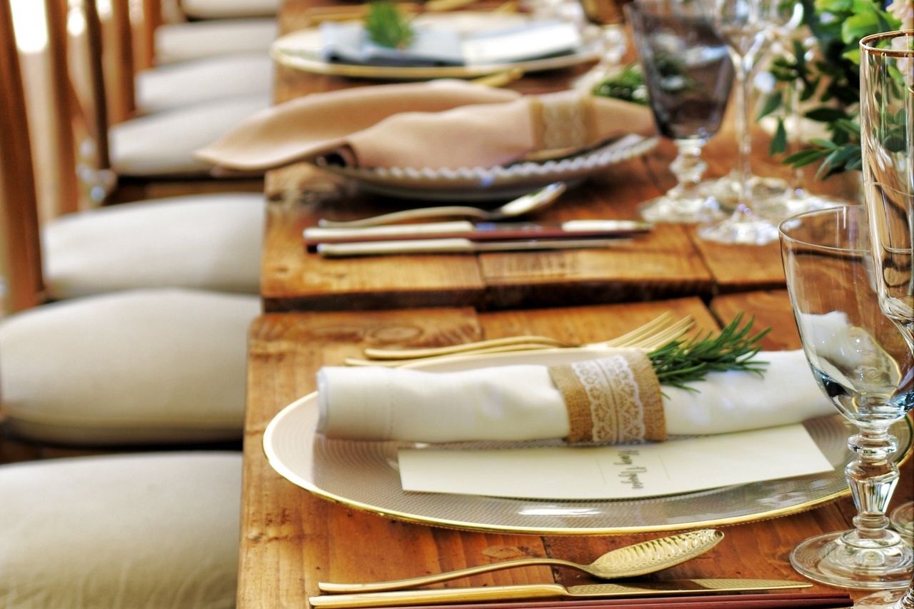 A long table set for a catered event